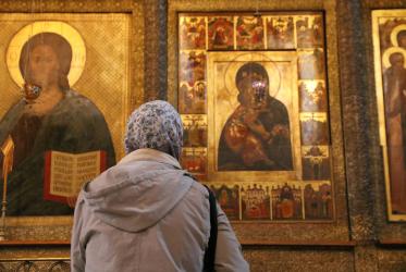 a person observes icons on display