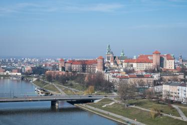Aerial city view with the bridge over the river and a castle
