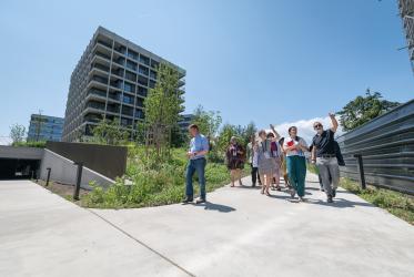members of the WCC central committee visit Green Village 